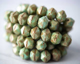 English Cut Czech glass beads for beadwork and crafts. 10mm sized beads in opaque sage green color. 0EVE2272 EV Emporium Co