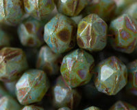 10mm English Cut Czech Glass Beads in opaque sage green with brown Picasso finish. 0EVE2280 Sold by EV Emporium Co