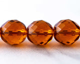 14mm Fire Polished Beads topaz color 00EVE579 Sold by EV Emporium Co