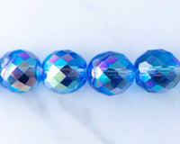 Czech Fire Polished Glass Beads in light blue AB color. Large 14mm size for crafts and beading.