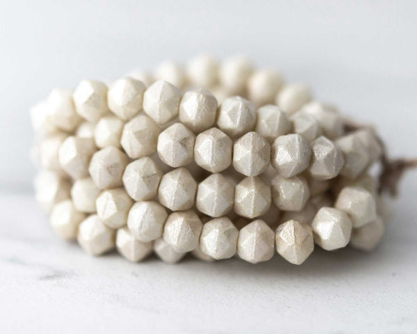 English Cut Czech glass beads for beadwork and crafts. 8mm sized beads in ivory with mercury finish shiny metallic coating. 0EVE2181 Sold by EV Emporium Co