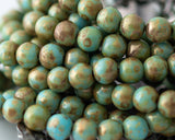 6mm Round Druk Beads Turquoise Blue with Gold Picasso Finish 0EVE1715