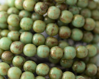 6mm Round Druk Beads Pistachio Green Picasso 0EVE1714